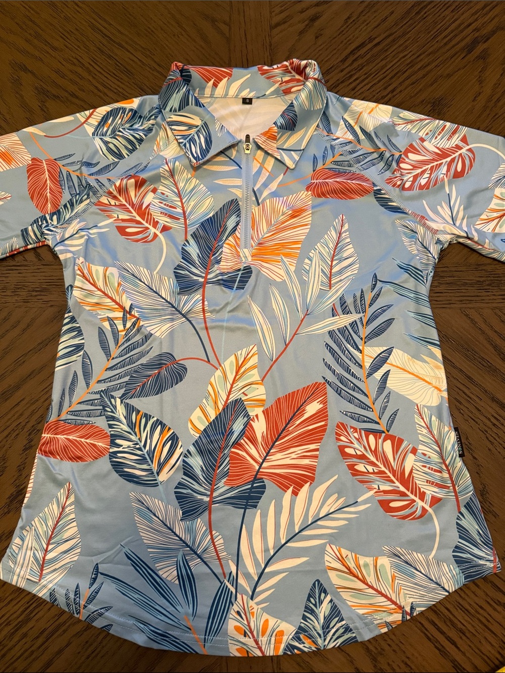 Women’s Light Blue Tropical Print Polo with Zip